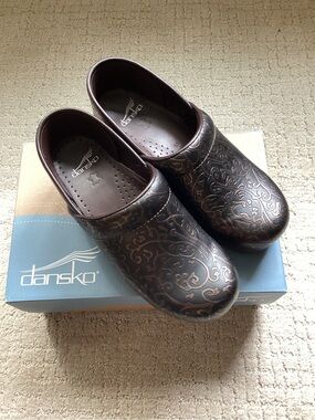 Dansko Embossed Floral Clogs in Dark Brown and Copper
